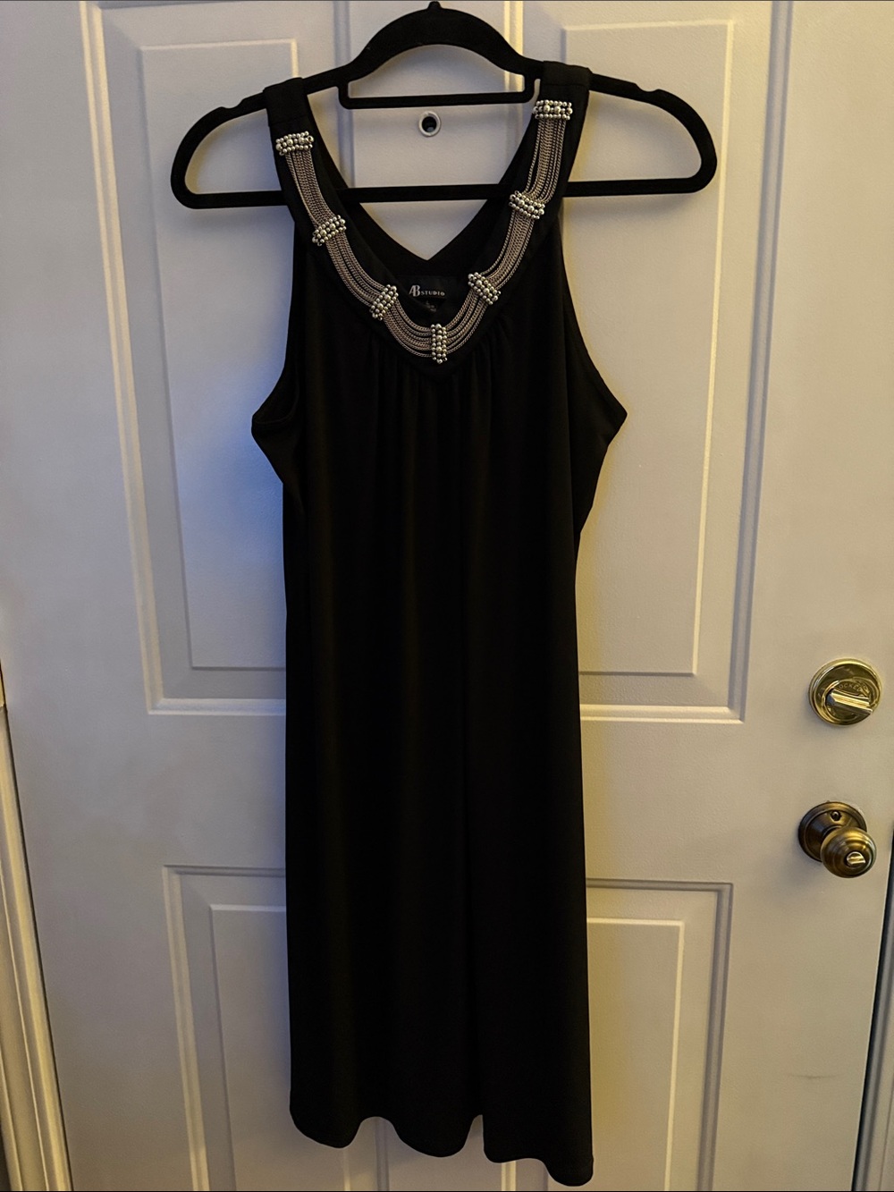 Metal Beaded neckline dress size L. Knee length.
